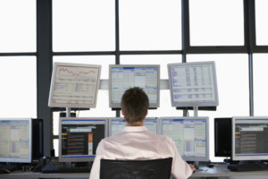 financial expert monitoring futures and options price movements