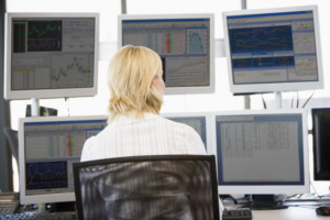 a trader utilizing day trading indicators to beat the market
